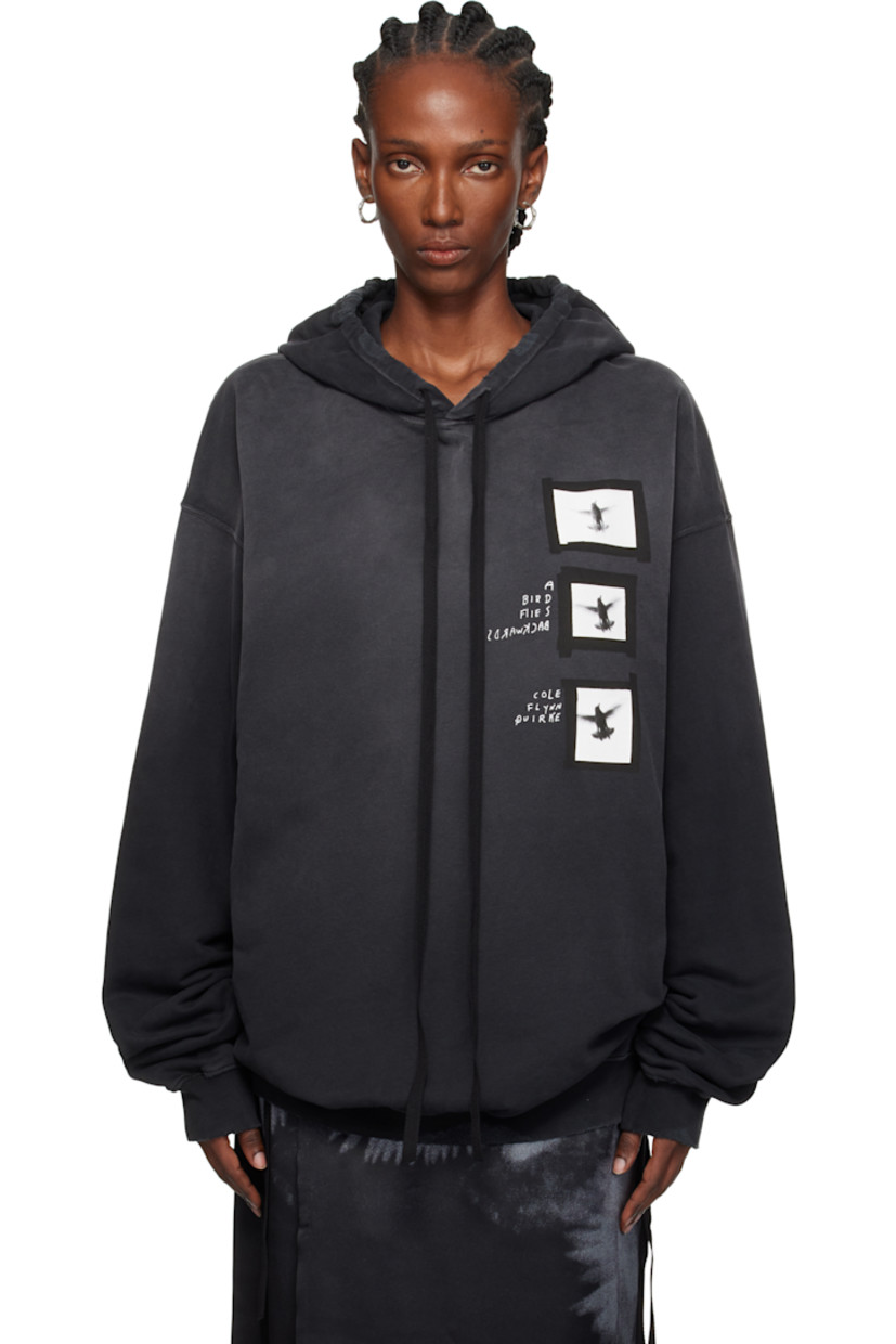 Cotton French terry hoodie. 

· Fading and distressing throughout 
· Drawstring at hood
· Text and graphics printed at front
· Rib-knit hem and cuffs
· Dropped shoulders
· Detachable webbing strap with logo plaque at interior

Supplier color: Faded black