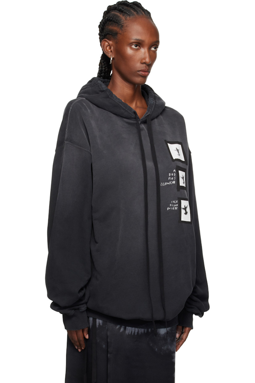 Cotton French terry hoodie. 

· Fading and distressing throughout 
· Drawstring at hood
· Text and graphics printed at front
· Rib-knit hem and cuffs
· Dropped shoulders
· Detachable webbing strap with logo plaque at interior

Supplier color: Faded black