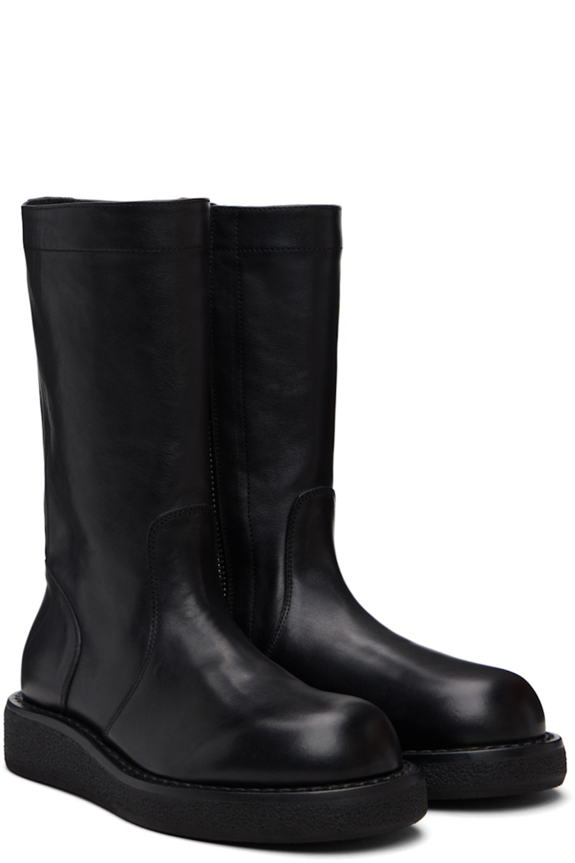 Mid-calf grained calfskin boots.

· Zip closure at inner side
· Rivet at collar 
· Crêpe rubber sole 
· Silver-tone hardware 

Supplier color: Black
