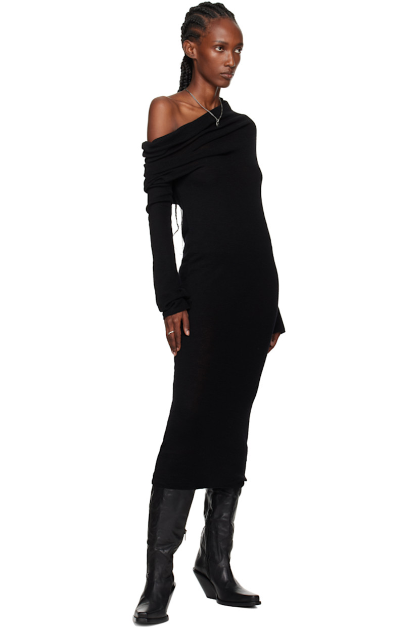 Knee-high washed and grained calfskin boots.

· Pointed square toe 
· Rivet and pull-loops at collar 
· Zip closure at inner side
· Stacked leather midsole and block heel 
· Suede sole with rubber injection
· Heel: H3.5"

Supplier color: Black
