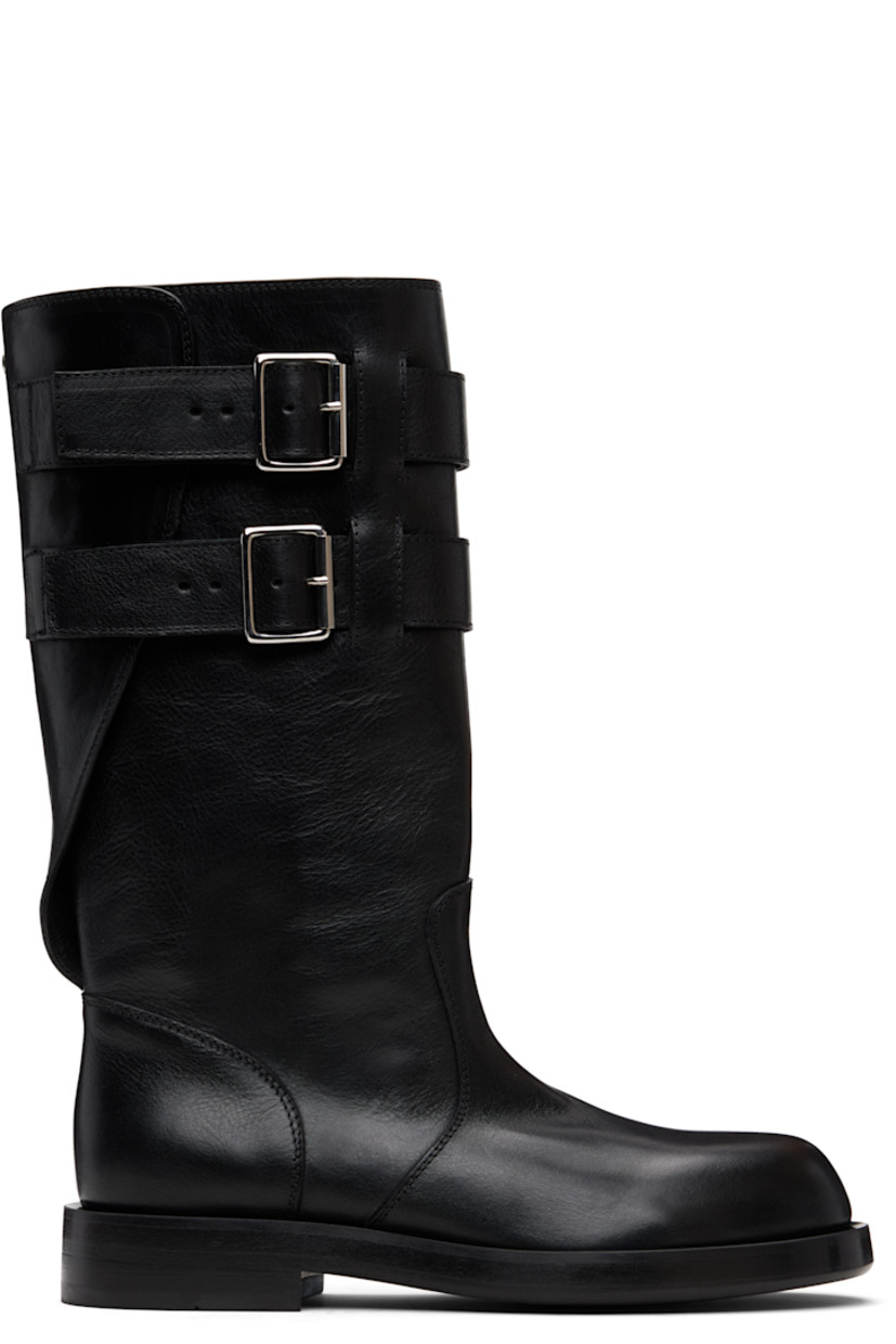 Mid-calf grained calfskin boots.

· Rivet and pin-buckle straps at collar 
· Stacked leather midsole and block heel
· Suede sole with rubber injection

Supplier color: Black