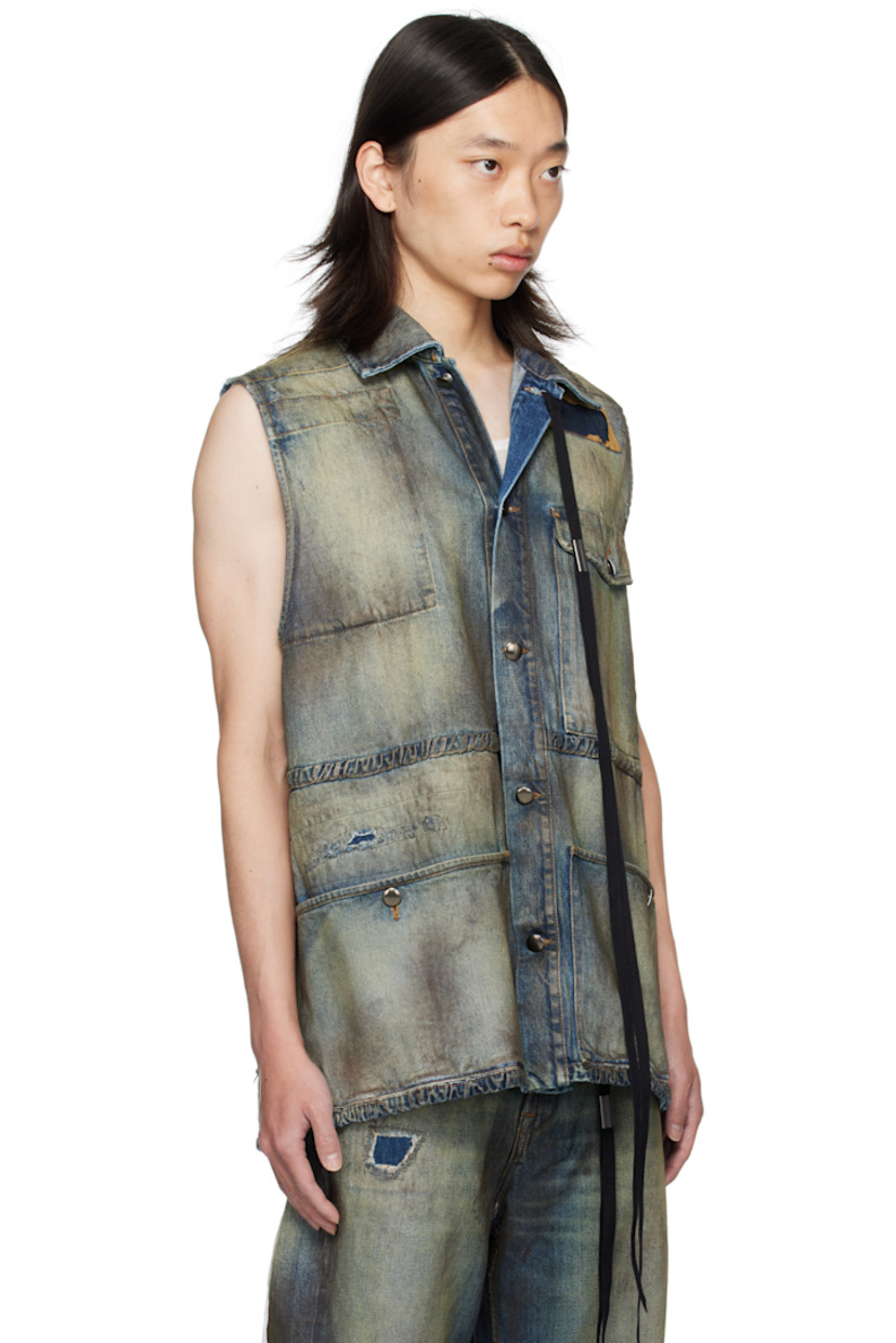 Sleeveless non-stretch denim jacket. 

· Discoloration, distressing, and sprayed dye throughout
· Topstitched patches throughout
· Spread collar
· Detachable ribbon with logo plaque at collar
· Button closure
· Flap pockets at chest and back waist
· Buttoned patch pockets at waist
· Contrast stitching in brown

Supplier color: Vintage blue