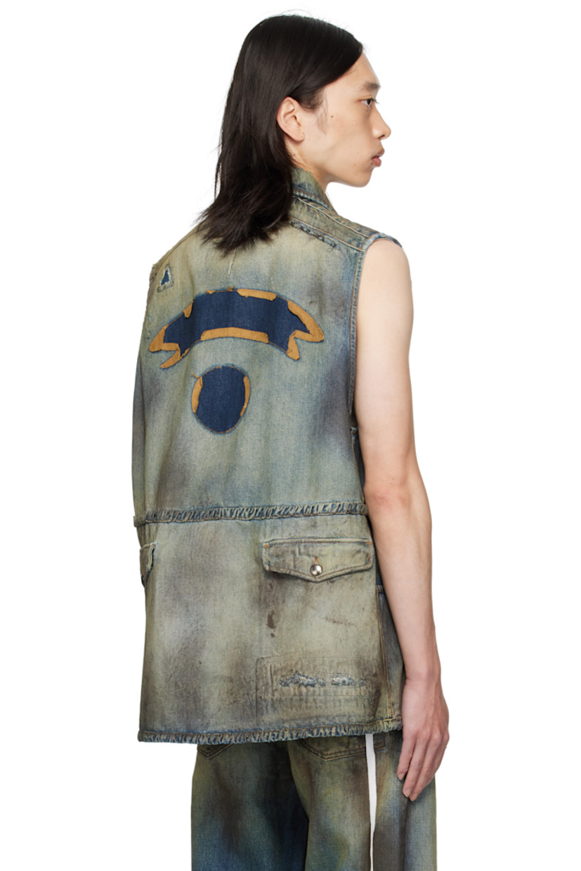 Sleeveless non-stretch denim jacket. 

· Discoloration, distressing, and sprayed dye throughout
· Topstitched patches throughout
· Spread collar
· Detachable ribbon with logo plaque at collar
· Button closure
· Flap pockets at chest and back waist
· Buttoned patch pockets at waist
· Contrast stitching in brown

Supplier color: Vintage blue