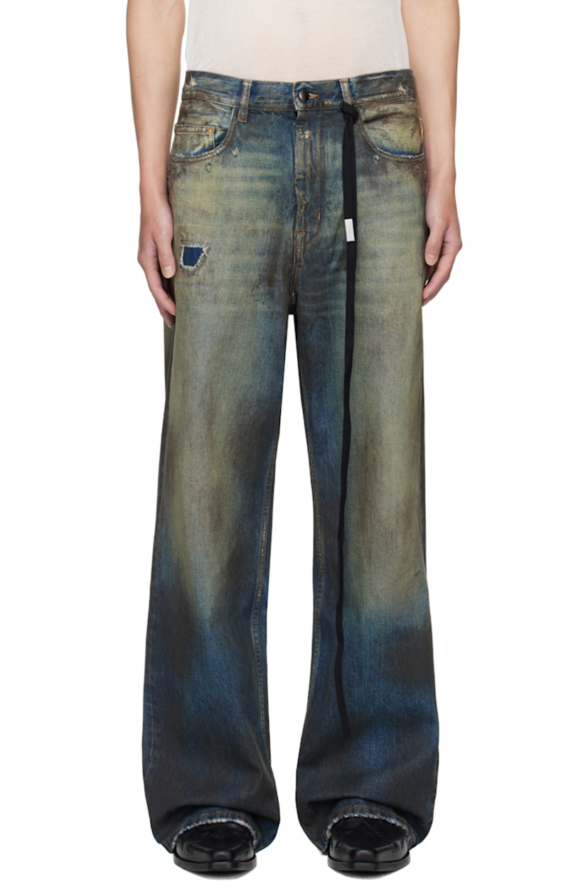 Non-stretch denim jeans.

· Discoloration, distressing, and sprayed dye throughout
· Topstitched detailing throughout
· Belt loops
· Detachable ribbon with logo plaque at waistband
· Five-pocket styling
· Zip fly
· Distressed patches at front and back

Supplier color: Vintage blue