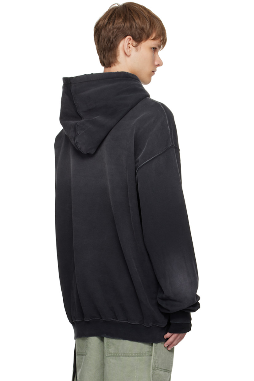 Cotton French terry hoodie.

· Fading and distressing throughout
· Drawstring at hood
· Printed patches at front
· Rib-knit hem and cuffs
· Dropped shoulders
· Integrated ribbon with logo plaque at interior

Supplier color: Faded black