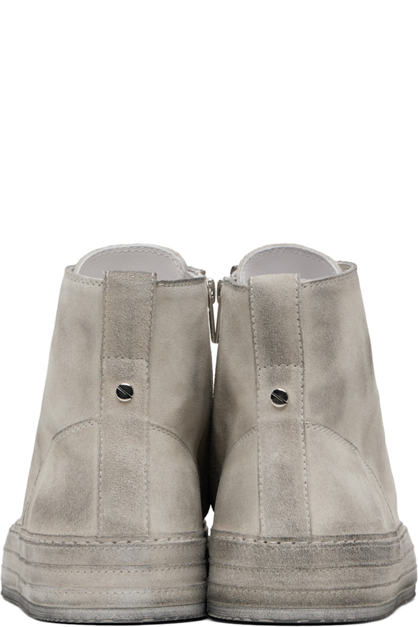High-top calfskin suede sneakers.

· Smudging throughout 
· Lace-up closure
· Zip closure at inner side
· Pull-loop and rivet at collar 
· Treaded rubber sole 

Supplier color: Chalk