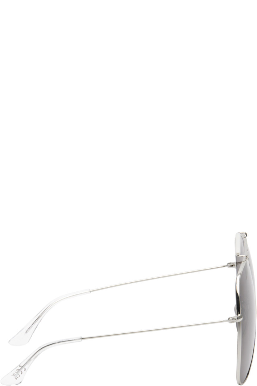 Aviator-style metal-frame sunglasses in silver tone.

· Handcrafted
· Gray lenses
· 100% UVA/UVB protection, category 3
· Adjustable rubber nose pads
· Double bridge
· Logo engraved at top bar
· Transparent acetate temple tips
· Includes pouch
· Size: 67.07 145

Supplier color: Silver