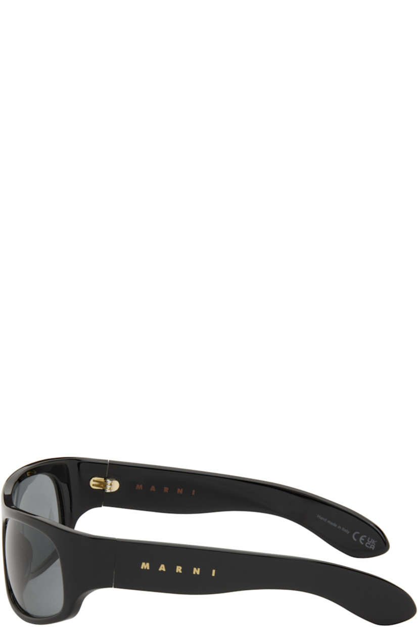 Handcrafted wraparound acrylic-frame sunglasses in black.

· Gray lenses
· Integrated nose pads
· Logo etched at temples 
· Includes pouch
· Size: 62.17 125

Supplier color: Black