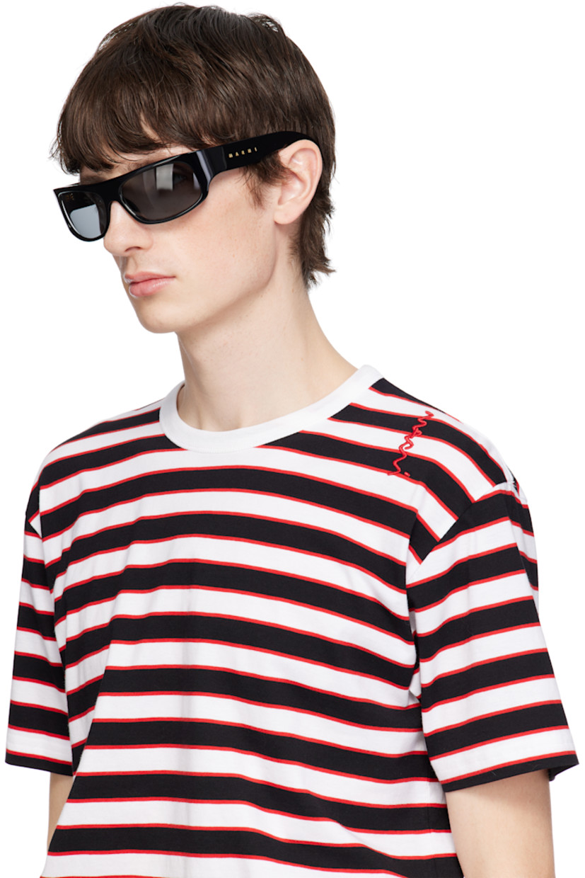 Handcrafted wraparound acrylic-frame sunglasses in black.

· Gray lenses
· Integrated nose pads
· Logo etched at temples 
· Includes pouch
· Size: 62.17 125

Supplier color: Black