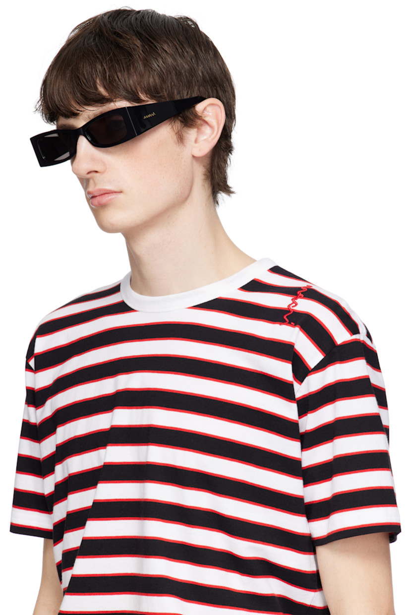 Handcrafted rectangular acetate-frame sunglasses in black.

· Gray lenses
· 100% UV protection, category 3
· Integrated nose pads
· Gold-tone logo hardware at temples
· Includes pouch
· Size: 56.16 145

Supplier color: Black