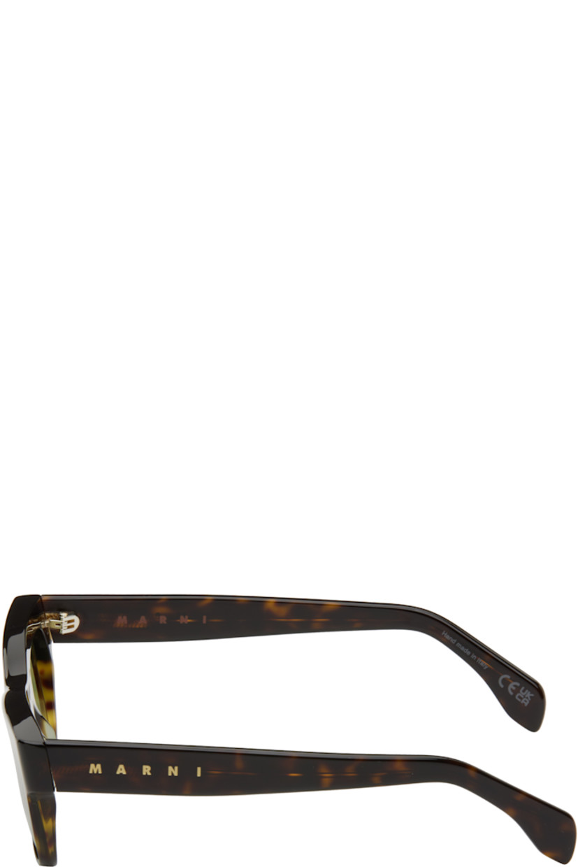 Handcrafted rectangular tortoiseshell acetate-frame sunglasses in brown.

· Green lenses
· 100% UV protection, category 2
· Integrated nose pads
· Logo etched at temples 
· Includes pouch
· Size: 55.19 145

Supplier color: 3627