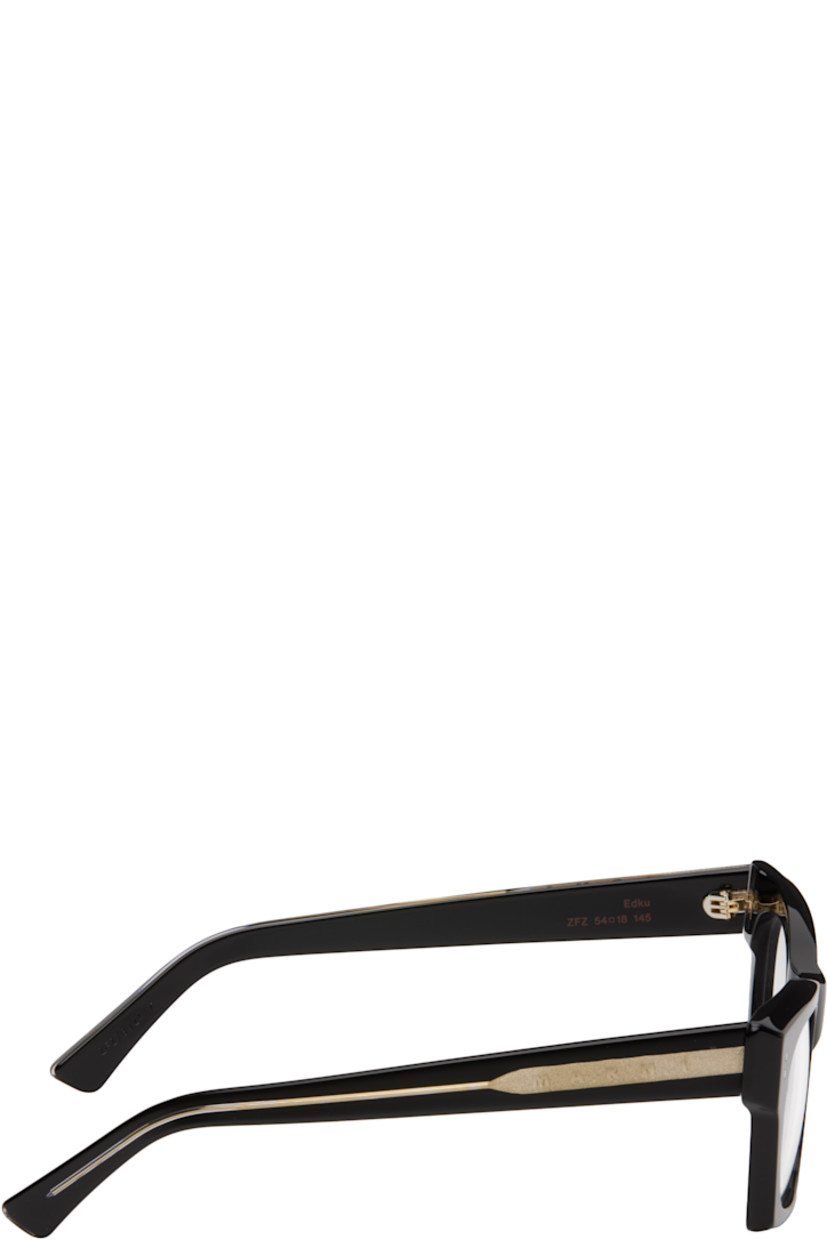 Handcrafted rectangular acetate-frame optical glasses in black.

· Integrated nose pads
· Logo engraved at temples
· Exposed core wires
· Includes pouch
· Size: 55.21 145

Part of the Marni x RETROSUPERFUTURE collaboration.

Supplier color: Optical black