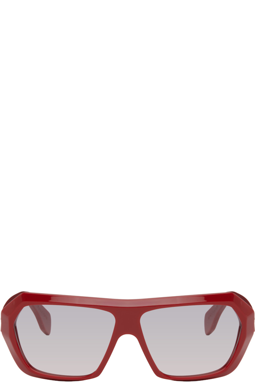 Handcrafted square acetate-frame sunglasses in red.

· Gradient gray Carl Zeiss lenses
· Integrated nose pads
· Logo embossed at temples
· Includes pouch
· Size: 64.13 145

Supplier color: Red