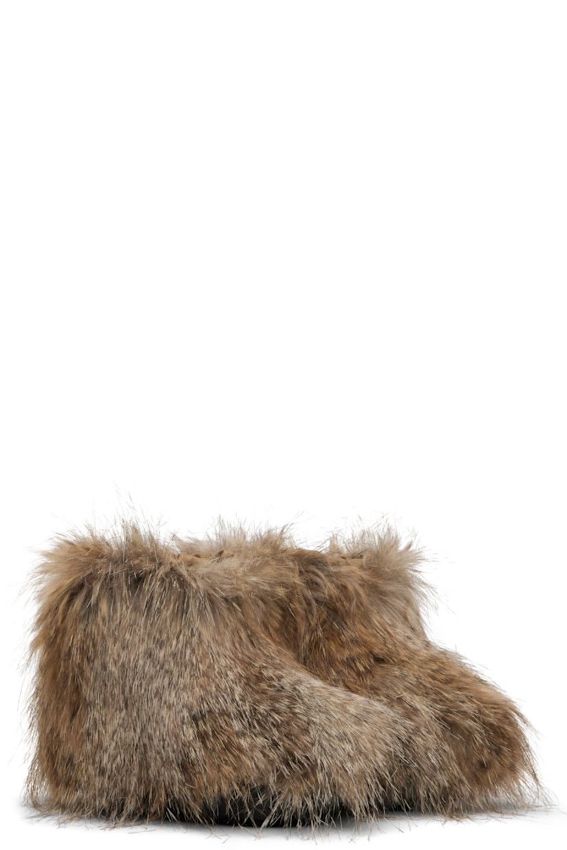 Ankle-high faux-fur boots.

· Lace-up closure
· Fleece lining
· Treaded rubber sole

Supplier color: Brown

Marni EU Size: child's foot length 
24: 5.75-6" / 14.5-15 cm 
25: 6-6.25" / 15-16 cm 
26: 6.25-6.5" / 16-16.5 cm 
27: 6.5-6.75" / 16.5-17 cm 
28: 6.75-7" / 17.3-18 cm 
29: 7-7.25" / 18-18.6 cm 
30: 7.25-7.5" / 18.6-19.3 cm 
31: 7.5-7.75" / 19.3-20 cm 
32: 7.75-8" / 20-20.5 cm 
33: 8-8.5" / 20.5-21.3 cm 
34: 8.5-8.75" / 21.3-22 cm 
35: 8.75-9" / 22-23 cm 
36: 9-9.25" / 23-23.5 cm 
37: 9.25-9.5" / 23.5-24 cm 
38: 9.5-9.75" / 24-25 cm 
39: 9.75-10" / 25-25.5 cm 
40: 10-10.25" / 25.5-26 cm