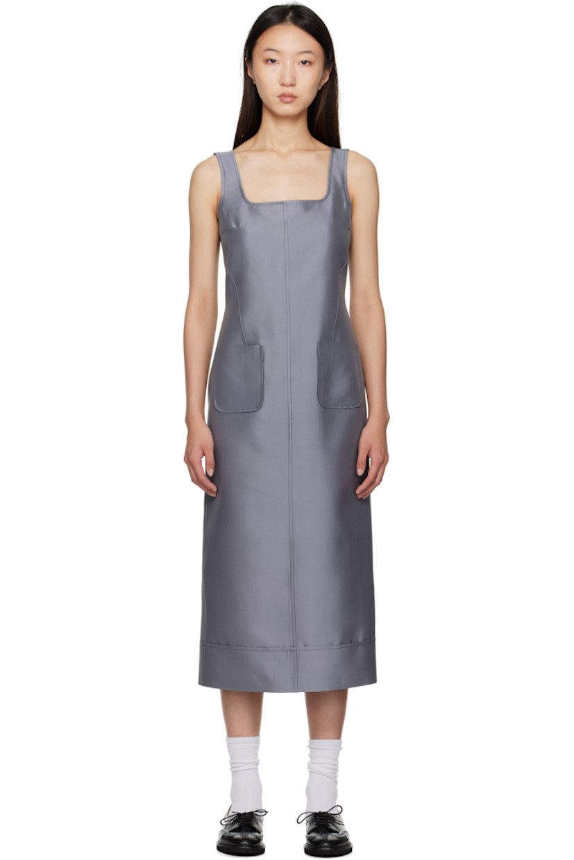 Woven wool- and silk-blend maxi dress.

· Square neck
· Patch pockets at front
· Tricolor loop at back collar
· Zip closure at back
· Vented back hem
· Full silk chiffon lining

Supplier color: Med Grey