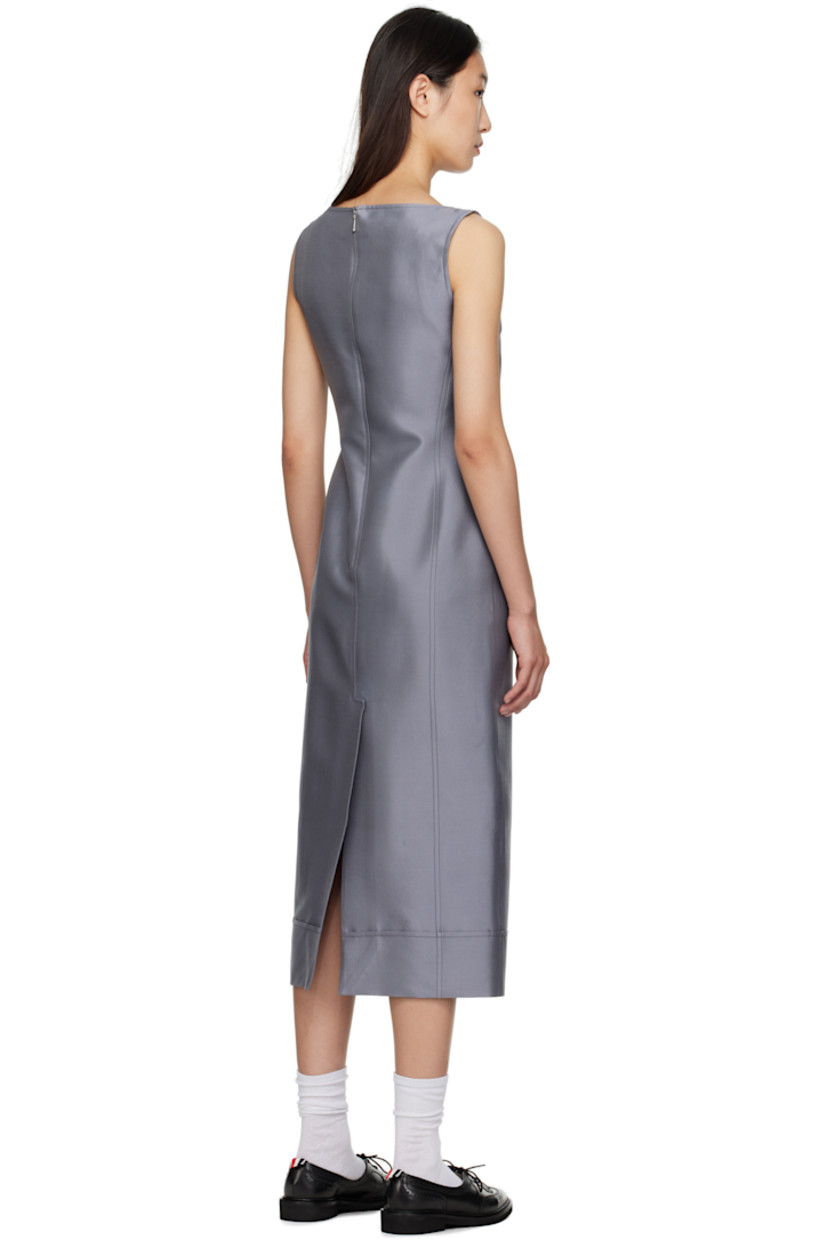 Woven wool- and silk-blend maxi dress.

· Square neck
· Patch pockets at front
· Tricolor loop at back collar
· Zip closure at back
· Vented back hem
· Full silk chiffon lining

Supplier color: Med Grey