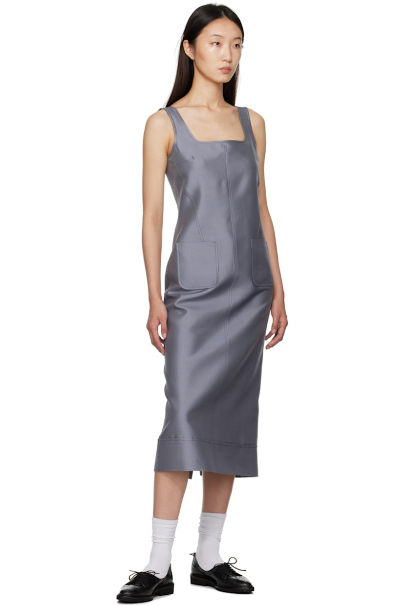 Woven wool- and silk-blend maxi dress.

· Square neck
· Patch pockets at front
· Tricolor loop at back collar
· Zip closure at back
· Vented back hem
· Full silk chiffon lining

Supplier color: Med Grey