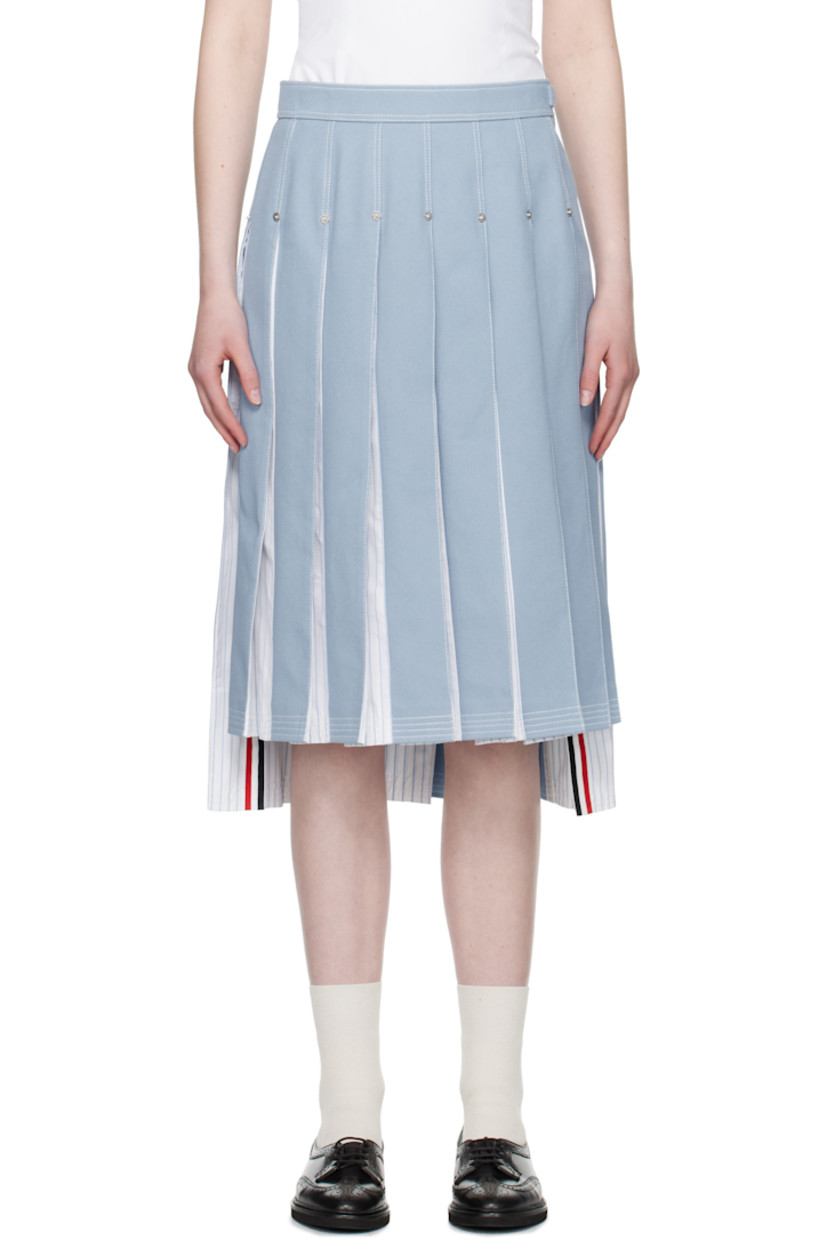 Non-stretch denim and cotton poplin midi skirt. Pleats, stripes, logo-engraved rivets throughout.

· Paneled construction 
· Adjustable button tab at waistband
· Tricolor grosgrain flag at back waistband 
· Full poplin lining
· Contrast stitching in white 

Supplier color: Light blue