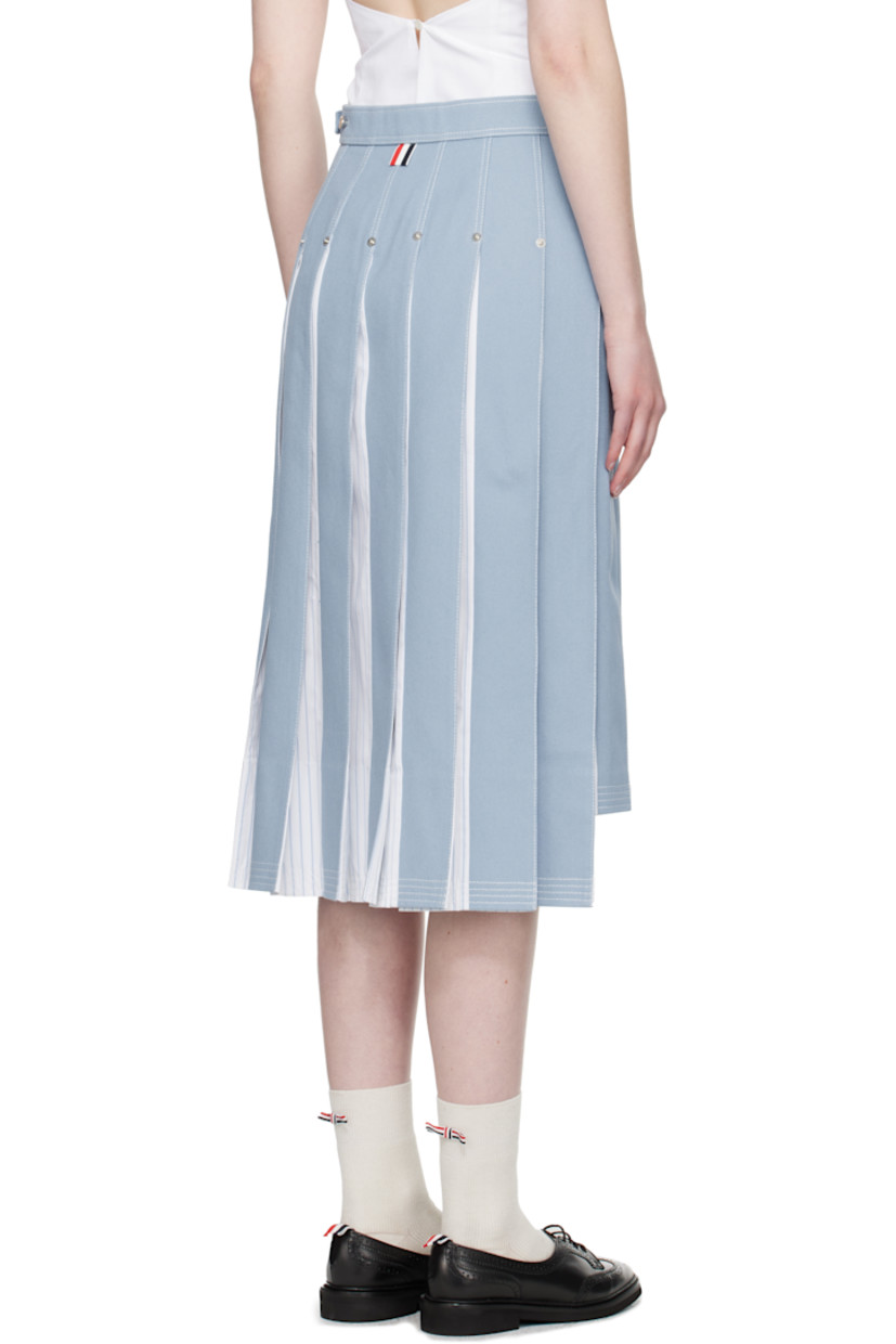 Non-stretch denim and cotton poplin midi skirt. Pleats, stripes, logo-engraved rivets throughout.

· Paneled construction 
· Adjustable button tab at waistband
· Tricolor grosgrain flag at back waistband 
· Full poplin lining
· Contrast stitching in white 

Supplier color: Light blue