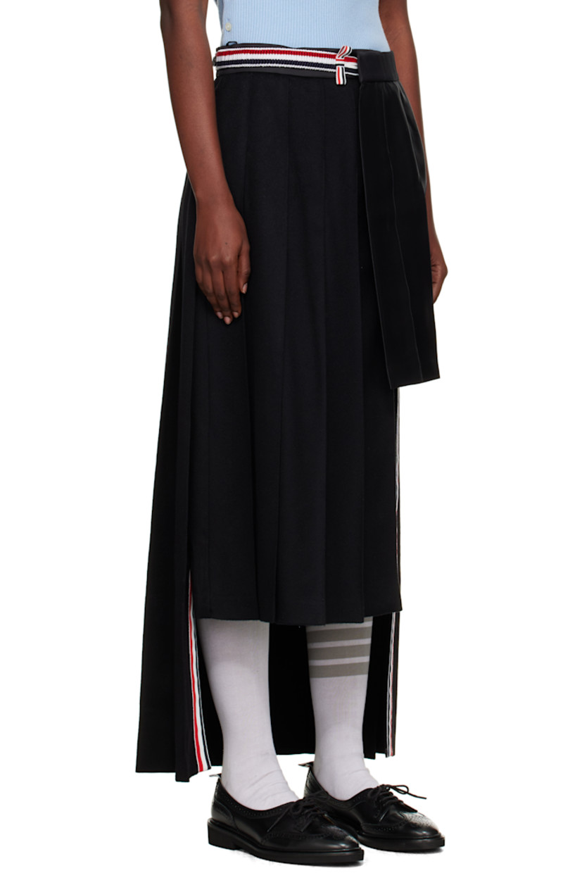 Paneled cashmere melton and silk-blend twill midi skirt. 

· Wrap construction 
· Pleats throughout 
· Button fastening at waistband
· Tricolor grosgrain trim at interior
· Asymmetric hem 
· Tricolor grosgrain flag at back waist

Supplier color: Black