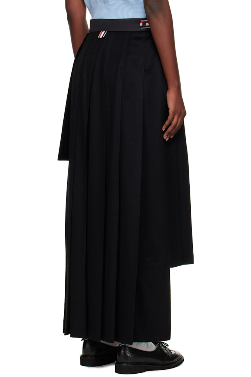 Paneled cashmere melton and silk-blend twill midi skirt. 

· Wrap construction 
· Pleats throughout 
· Button fastening at waistband
· Tricolor grosgrain trim at interior
· Asymmetric hem 
· Tricolor grosgrain flag at back waist

Supplier color: Black