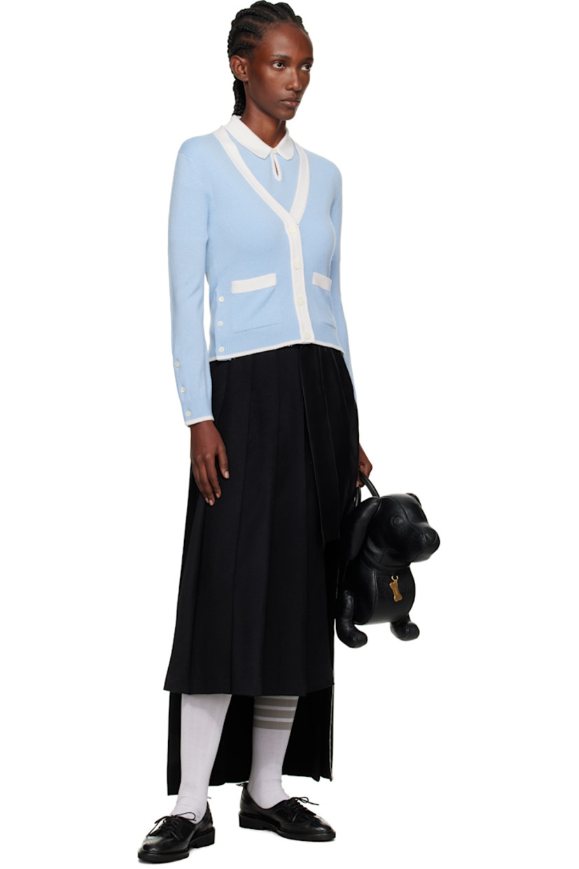 Paneled cashmere melton and silk-blend twill midi skirt. 

· Wrap construction 
· Pleats throughout 
· Button fastening at waistband
· Tricolor grosgrain trim at interior
· Asymmetric hem 
· Tricolor grosgrain flag at back waist

Supplier color: Black