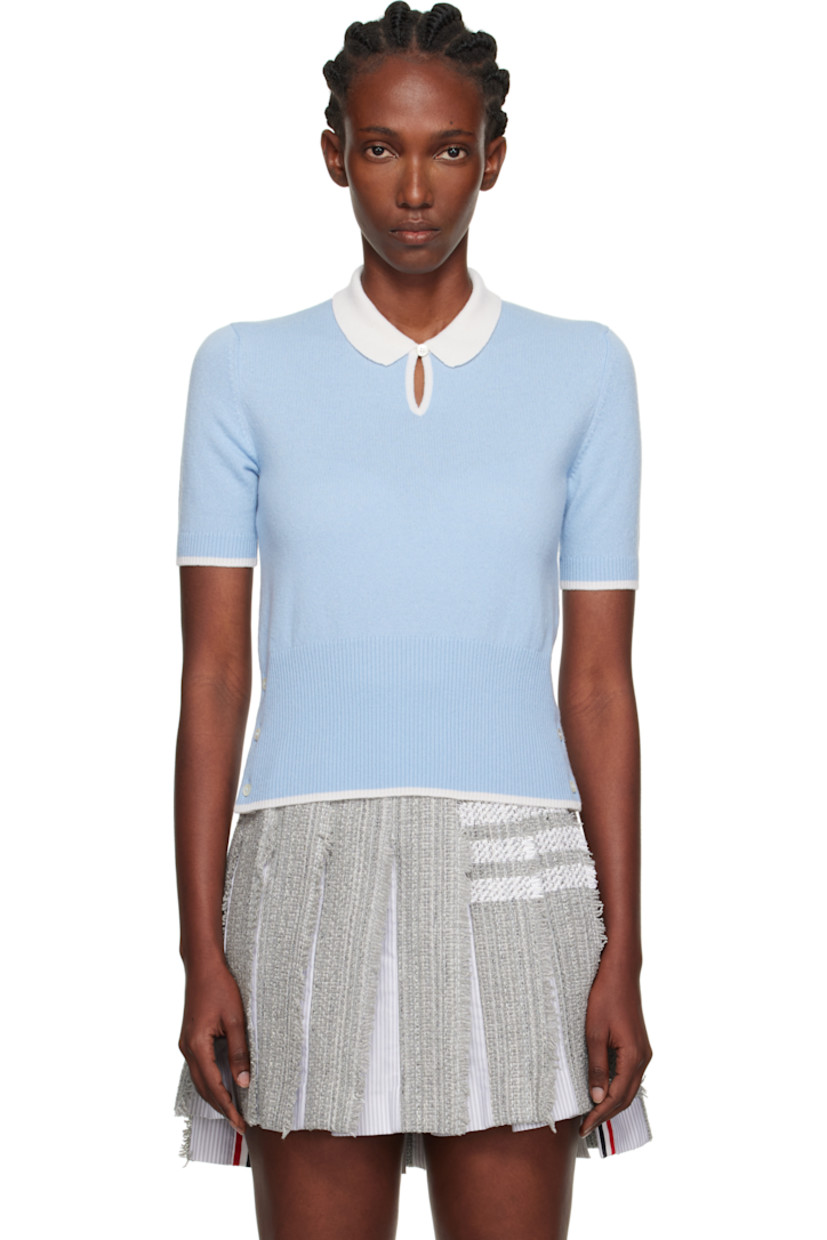 Knit cashmere polo.

· Rib-knit spread collar, cuffs, and hem
· Button keyhole at collar
· Buttoned vent at side seams
· Concealed tricolor trim at vents
· Tricolor flag at back collar

Supplier color: Light Blue