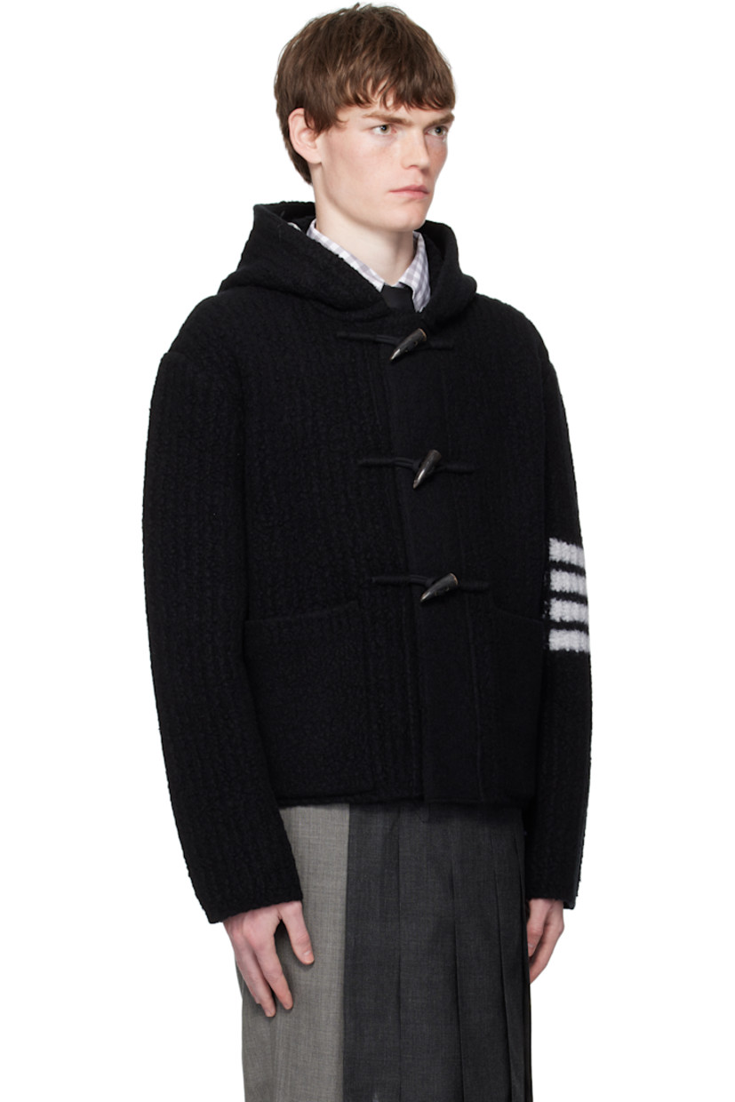Felted rib-knit virgin wool-blend jacket.

· Rib-knit hood 
· Toggle closure
· Patch pockets at waist
· Stripes at sleeve
· Tricolor grosgrain flag at back collar

Supplier color: Black