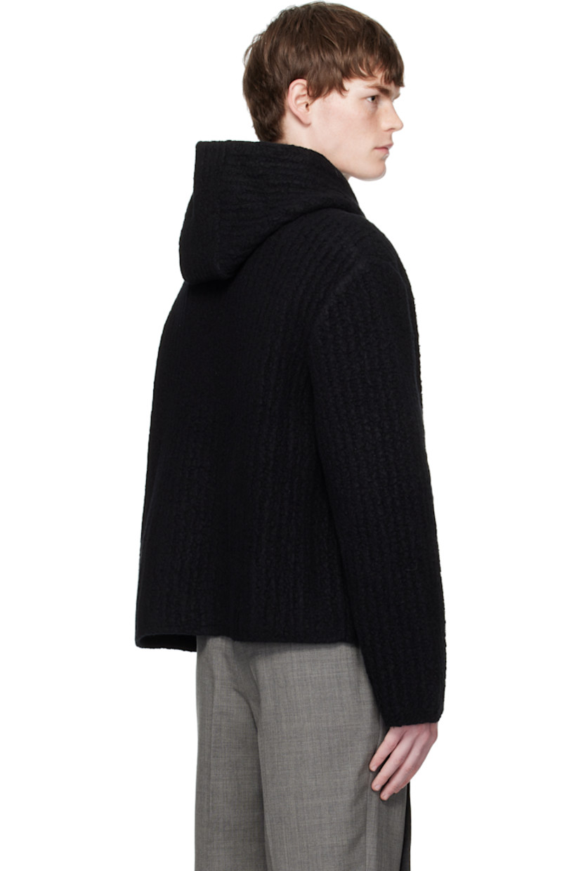 Felted rib-knit virgin wool-blend jacket.

· Rib-knit hood 
· Toggle closure
· Patch pockets at waist
· Stripes at sleeve
· Tricolor grosgrain flag at back collar

Supplier color: Black