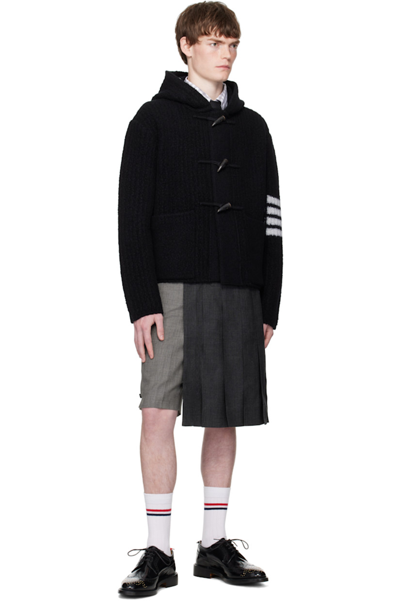 Felted rib-knit virgin wool-blend jacket.

· Rib-knit hood 
· Toggle closure
· Patch pockets at waist
· Stripes at sleeve
· Tricolor grosgrain flag at back collar

Supplier color: Black