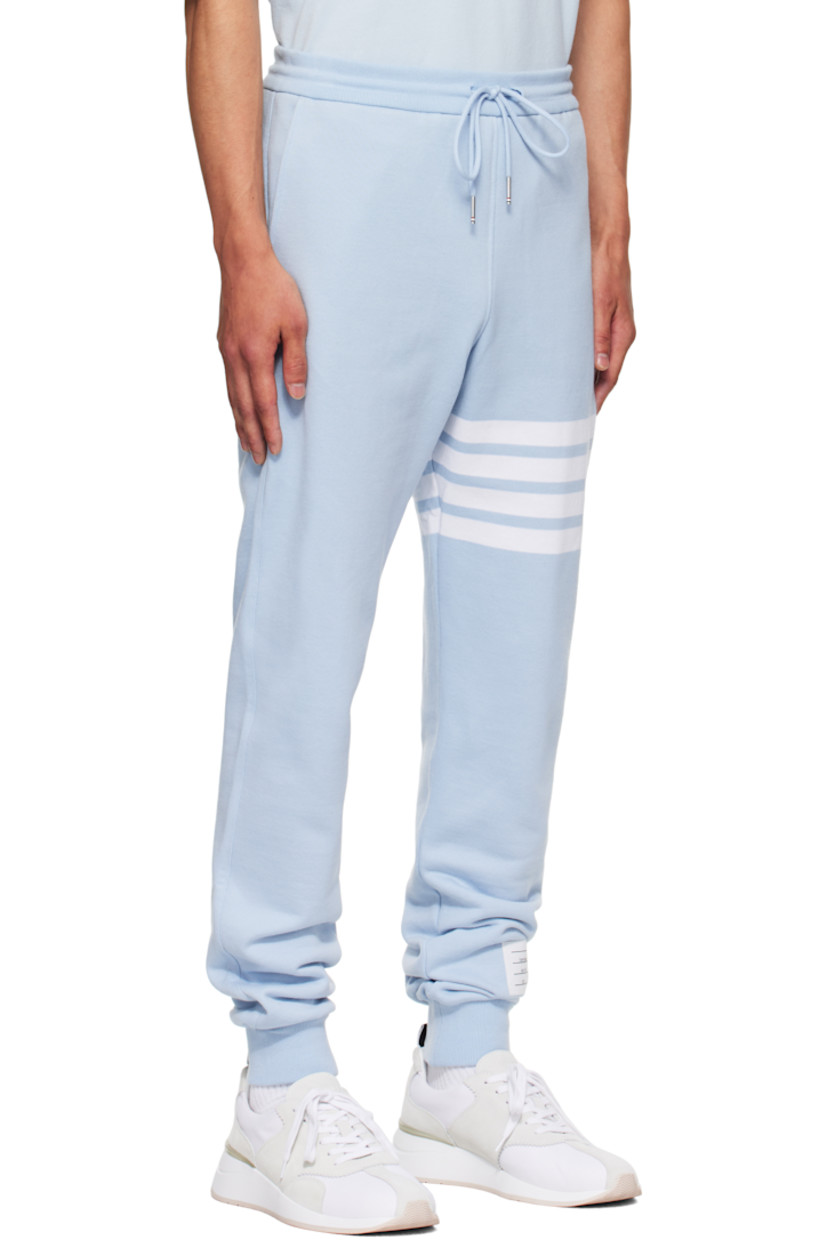 Cotton French terry sweatpants.

· Drawstring at elasticized waistband
· Three-pocket styling
· Stripes at leg
· Logo patch at cuff
· Rib-knit cuffs
· Tricolor grosgrain flag at back waistband

Supplier color: Light blue
