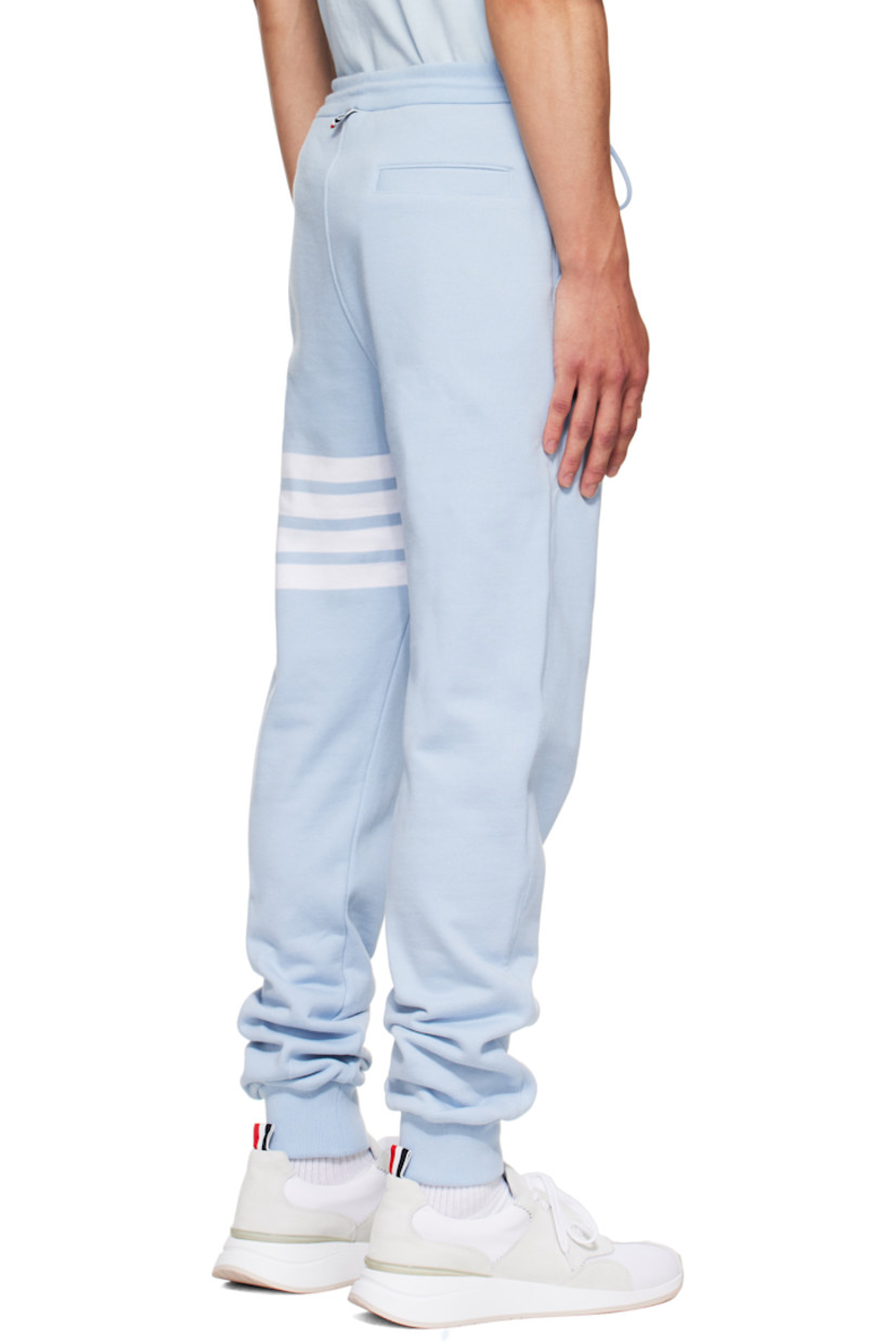 Cotton French terry sweatpants.

· Drawstring at elasticized waistband
· Three-pocket styling
· Stripes at leg
· Logo patch at cuff
· Rib-knit cuffs
· Tricolor grosgrain flag at back waistband

Supplier color: Light blue
