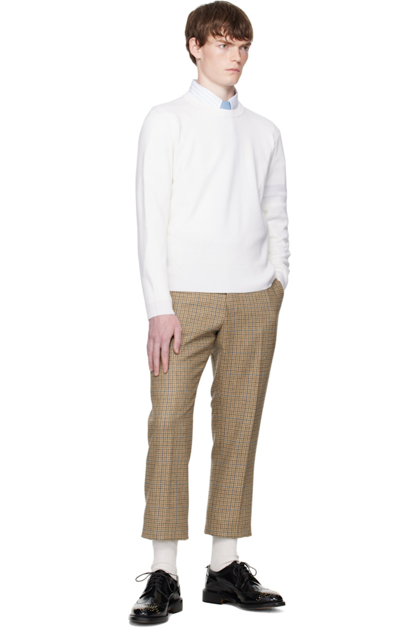Knit virgin wool-blend sweater.

· Rib-knit crewneck, hem, and cuffs
· Stripes at sleeve
· Tricolor grosgrain flag at back collar

Supplier color: White