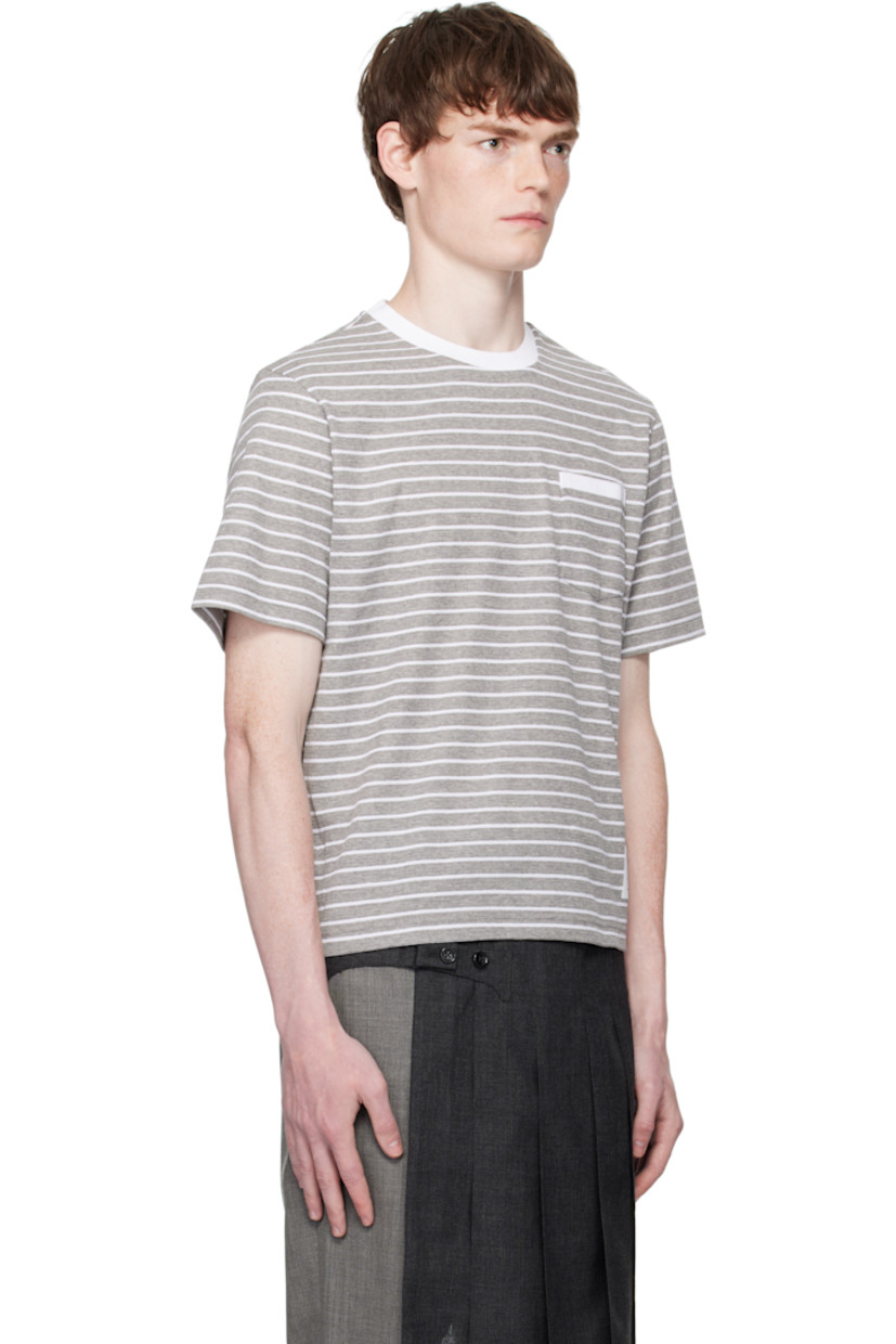 Rib-knit cotton T-shirt.

· Stripes throughout
· Rib-knit crewneck
· Patch pocket at chest
· Logo patch at front hem
· Button vent at side seams
· Tricolor grosgrain flag at back collar

Supplier color: Grey/White