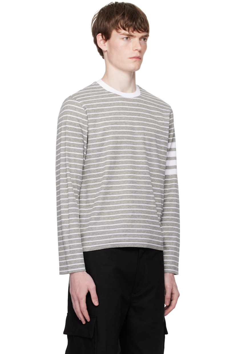 Rib-knit cotton T-shirt.

· Stripes throughout
· Rib-knit crewneck
· Logo patch at front hem
· Button vent at side seams
· Tricolor grosgrain flag at back collar

Supplier color: Grey/White