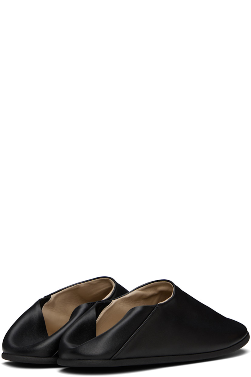 Grained calfskin loafers in black.

· Collapsible heel counter
· Grained kidskin lining
· Crêpe-rubber sole

Supplier color: Black