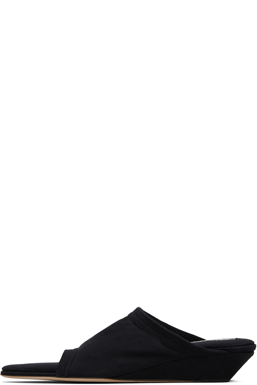 Cotton jersey mules in black. 

· Open almond toe
· Logo patch at padded footbed
· Covered wedge heel 
· Calfskin nubuck sole with rubber injection
· Heel: H1.25"

Supplier color: Black