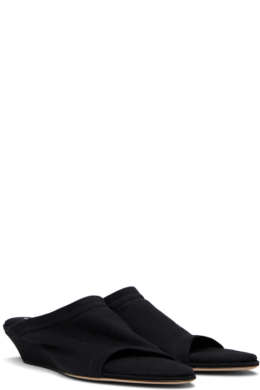 Cotton jersey mules in black. 

· Open almond toe
· Logo patch at padded footbed
· Covered wedge heel 
· Calfskin nubuck sole with rubber injection
· Heel: H1.25"

Supplier color: Black
