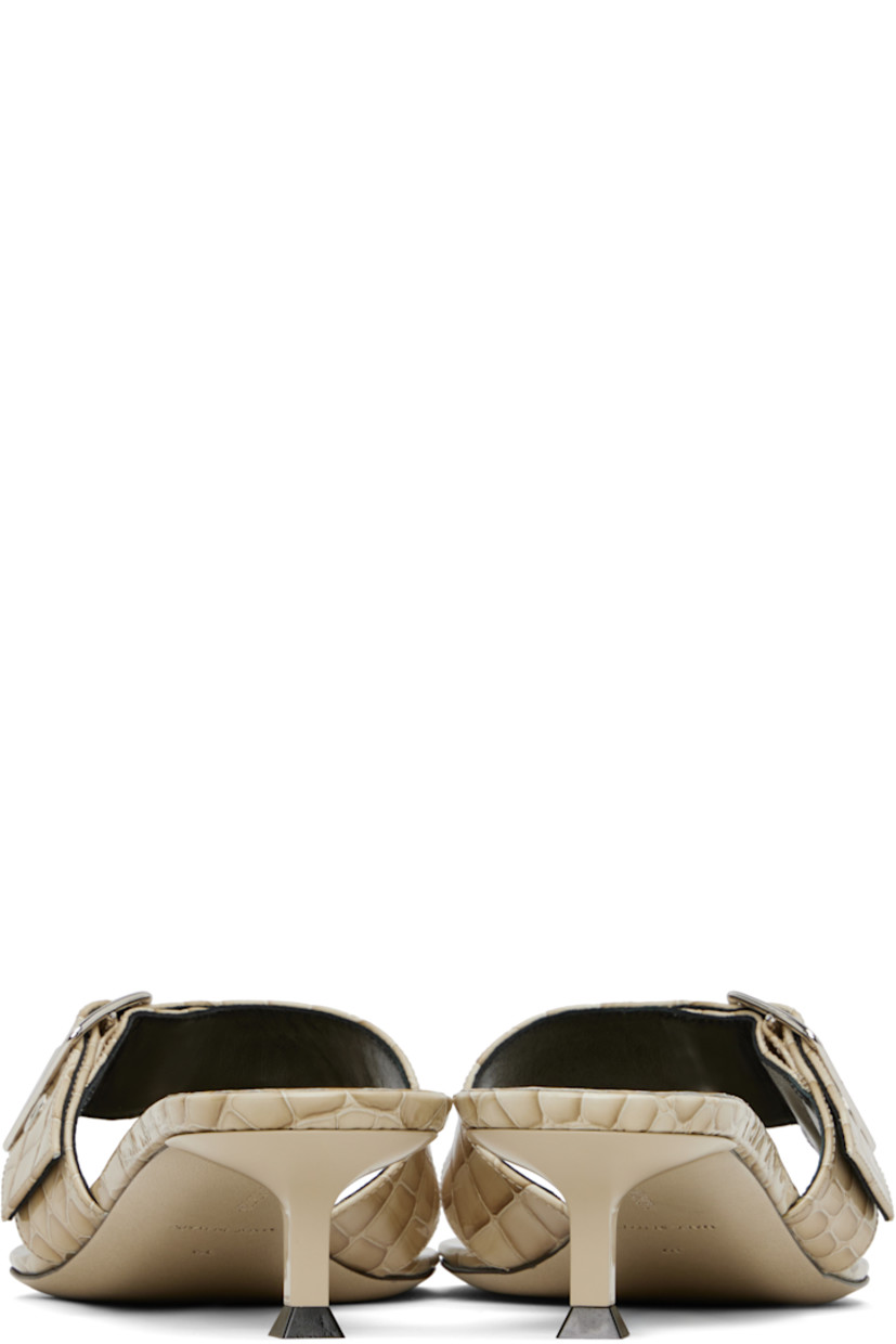 Snake-embossed patent calfskin heeled sandals in beige.

· Open square toe
· Pin-buckle thong-style strap
· Inset logo patch at footbed
· Grained kidskin lining
· Kitten heel with rubber injection 
· Calfskin nubuck sole with rubber injection
· Heel: H1.5"

Available exclusively at SSENSE.

Supplier color: Travertino