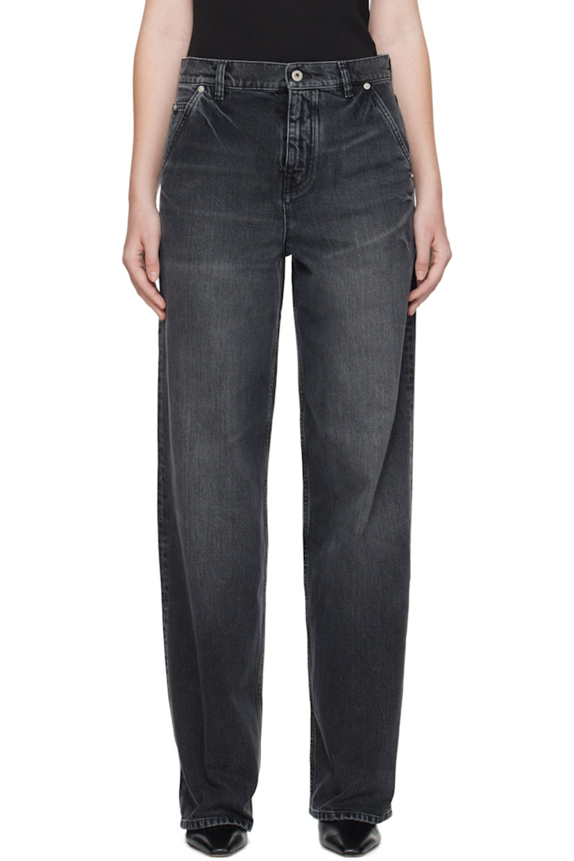 Stretch denim jeans. 

· Stonewashed
· Fading and whiskering throughout 
· Belt loops
· Five-pocket styling
· Zip fly 
· Logo patch at back waistband
· Cinch tab at back waist

Part of the Kenzo x Futura 2000 collaboration. 

Supplier color: Medium stone black denim
