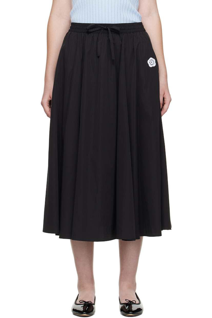 Cotton-blend satin midi skirt. 

· Drawstring at elasticized waistband
· Two-pocket styling
· Embroidered logo patch at waist
· Logo-woven twill trim at side seams

Supplier color: Black