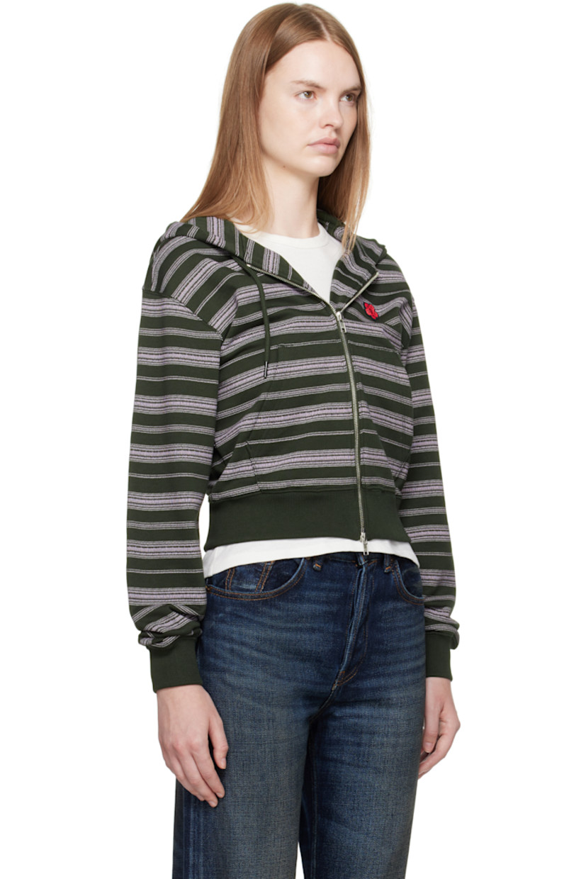 French terry hoodie. 

· Stripes printed throughout 
· Drawstring at hood
· Two-way zip closure
· Embroidered logo patch at chest 
· Patch pockets at waist 
· Rib-knit hem and cuffs
· Dropped shoulders
· Logo embroidered at cuff

Supplier color: Dark khaki