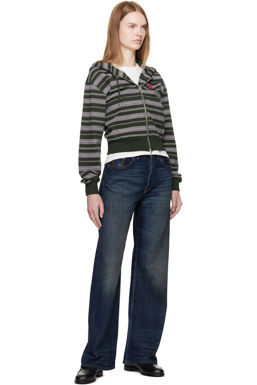 French terry hoodie. 

· Stripes printed throughout 
· Drawstring at hood
· Two-way zip closure
· Embroidered logo patch at chest 
· Patch pockets at waist 
· Rib-knit hem and cuffs
· Dropped shoulders
· Logo embroidered at cuff

Supplier color: Dark khaki