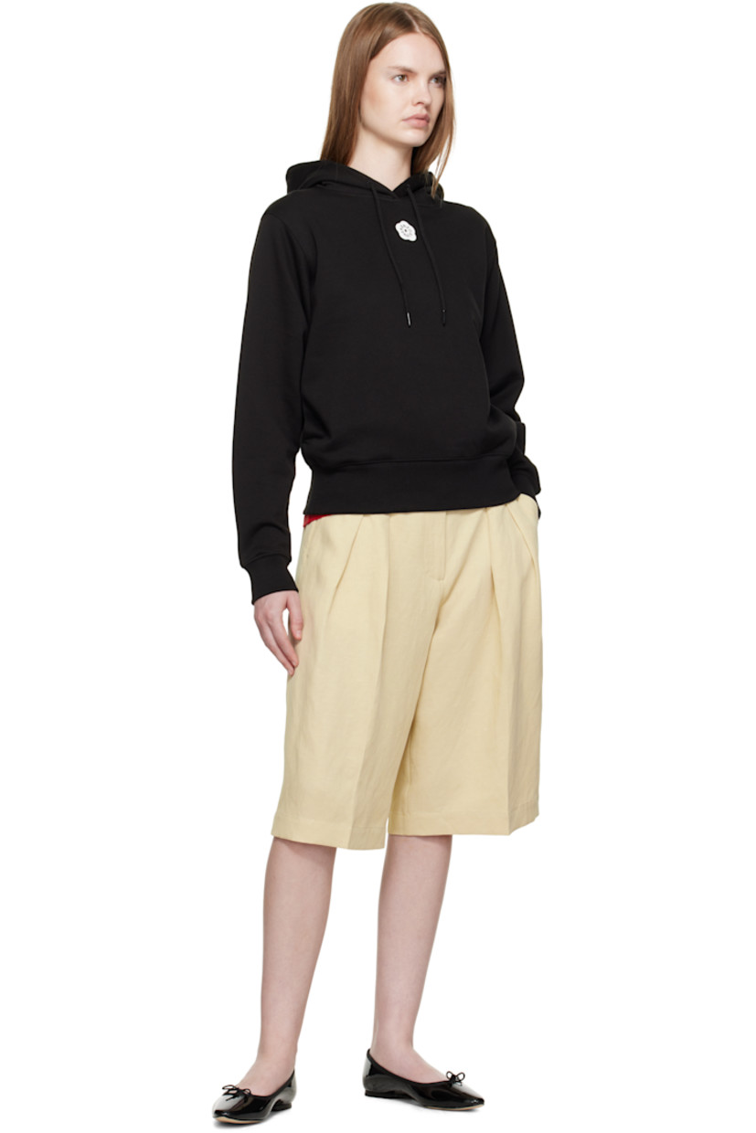French terry hoodie. 

· Drawstring at hood
· Logo graphic printed at chest and back
· Seam pockets at waist
· Rib-knit hem and cuffs

Supplier color: Black