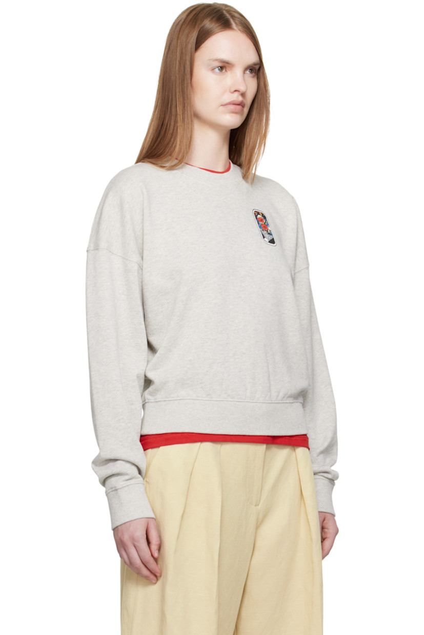 French terry sweatshirt.

· Rib-knit crewneck, hem, and cuffs
· Graphic printed at chest and back
· Logo printed at back collar 

Supplier color: Pale grey