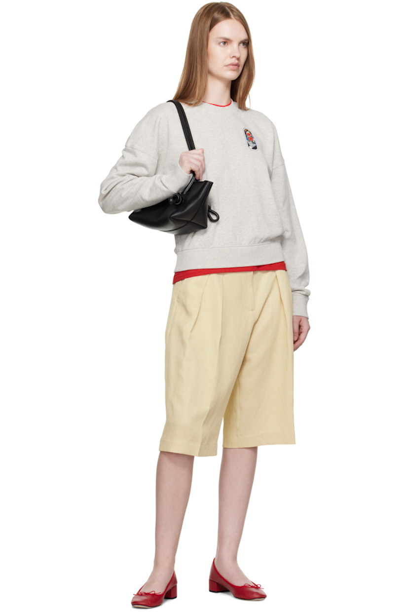 French terry sweatshirt.

· Rib-knit crewneck, hem, and cuffs
· Graphic printed at chest and back
· Logo printed at back collar 

Supplier color: Pale grey