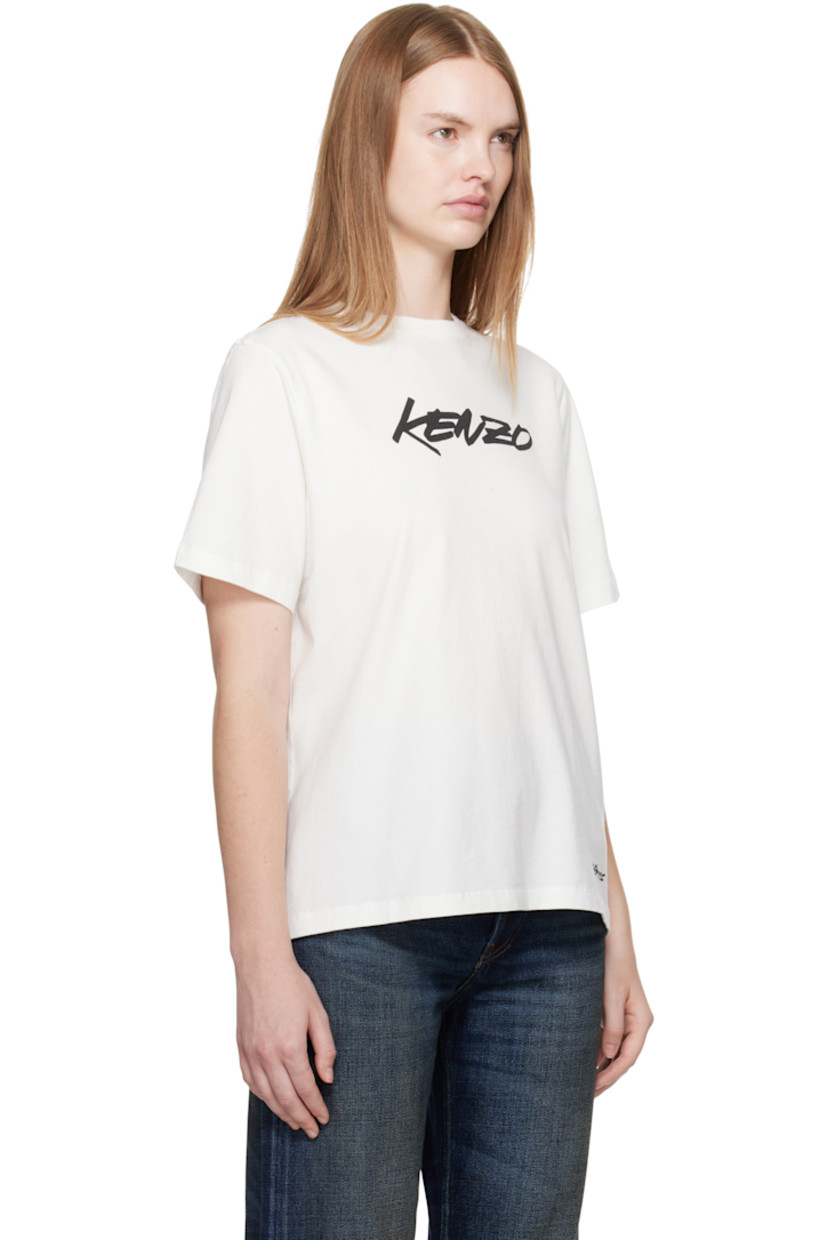 Cotton jersey T-shirt. 

· Rib-knit crewneck
· Logo and text printed at front 
· Logo patch at back collar 
· Text printed at back 

Part of the Kenzo x Futura 2000 collaboration.

Supplier color: Off-white