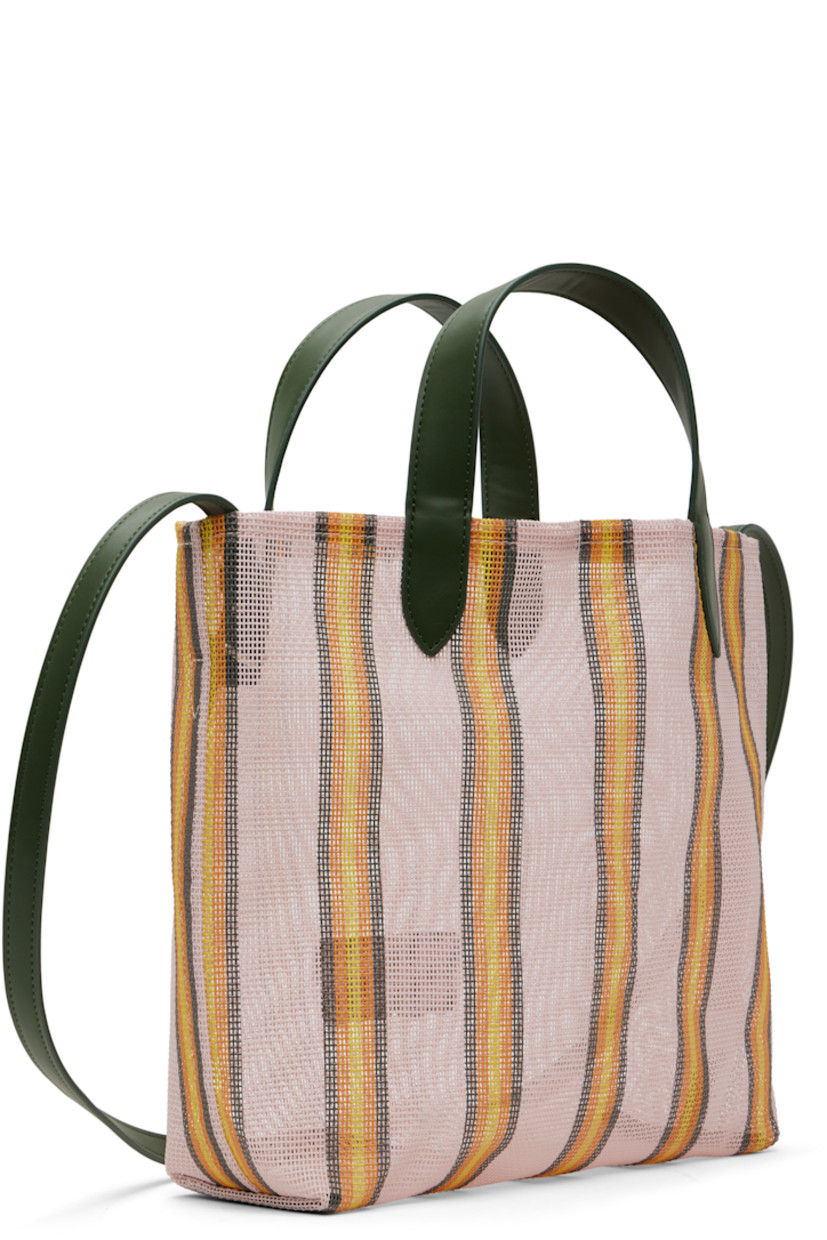 Sheer mesh tote.

· Stripes throughout
· Fixed faux-leather carry handles
· Detachable crossbody strap
· Logo patch at face
· H10.5" x W12" x D4"

Supplier color: Faded pink