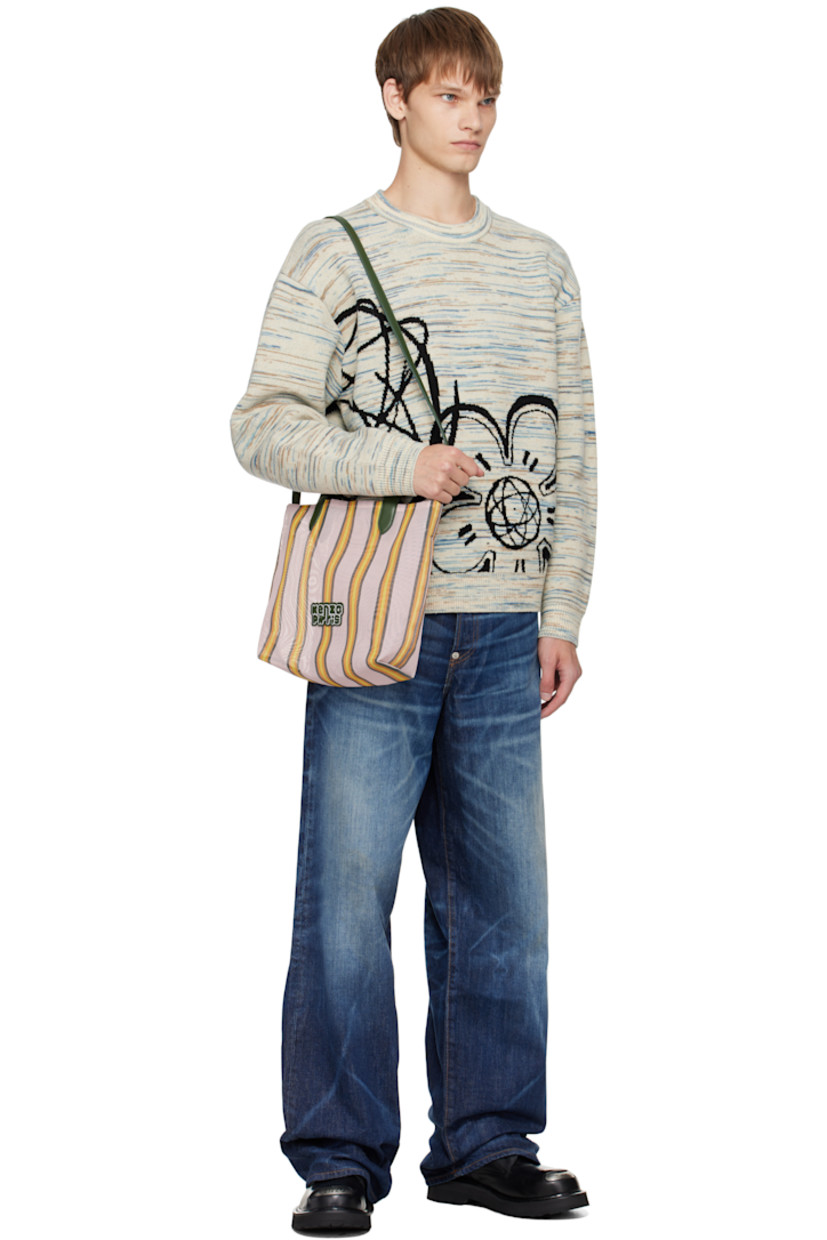 Sheer mesh tote.

· Stripes throughout
· Fixed faux-leather carry handles
· Detachable crossbody strap
· Logo patch at face
· H10.5" x W12" x D4"

Supplier color: Faded pink