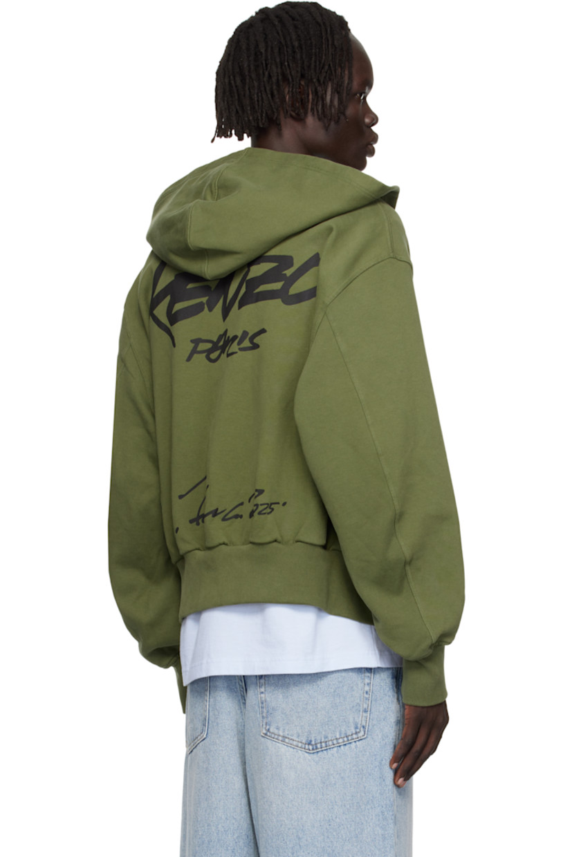 Stretch GOTS-certified organic cotton French terry hoodie.

· Two-way zip closure
· Logo printed at chest and back
· Patch pockets at front
· Rib-knit hem and cuffs
· Text printed at back

Part of the Kenzo x Futura 2000 collaboration.
 
Supplier color: Khaki